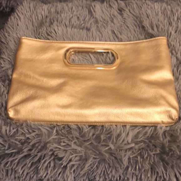 Charming Charlie Handbags - Charming Charlie gold clutch